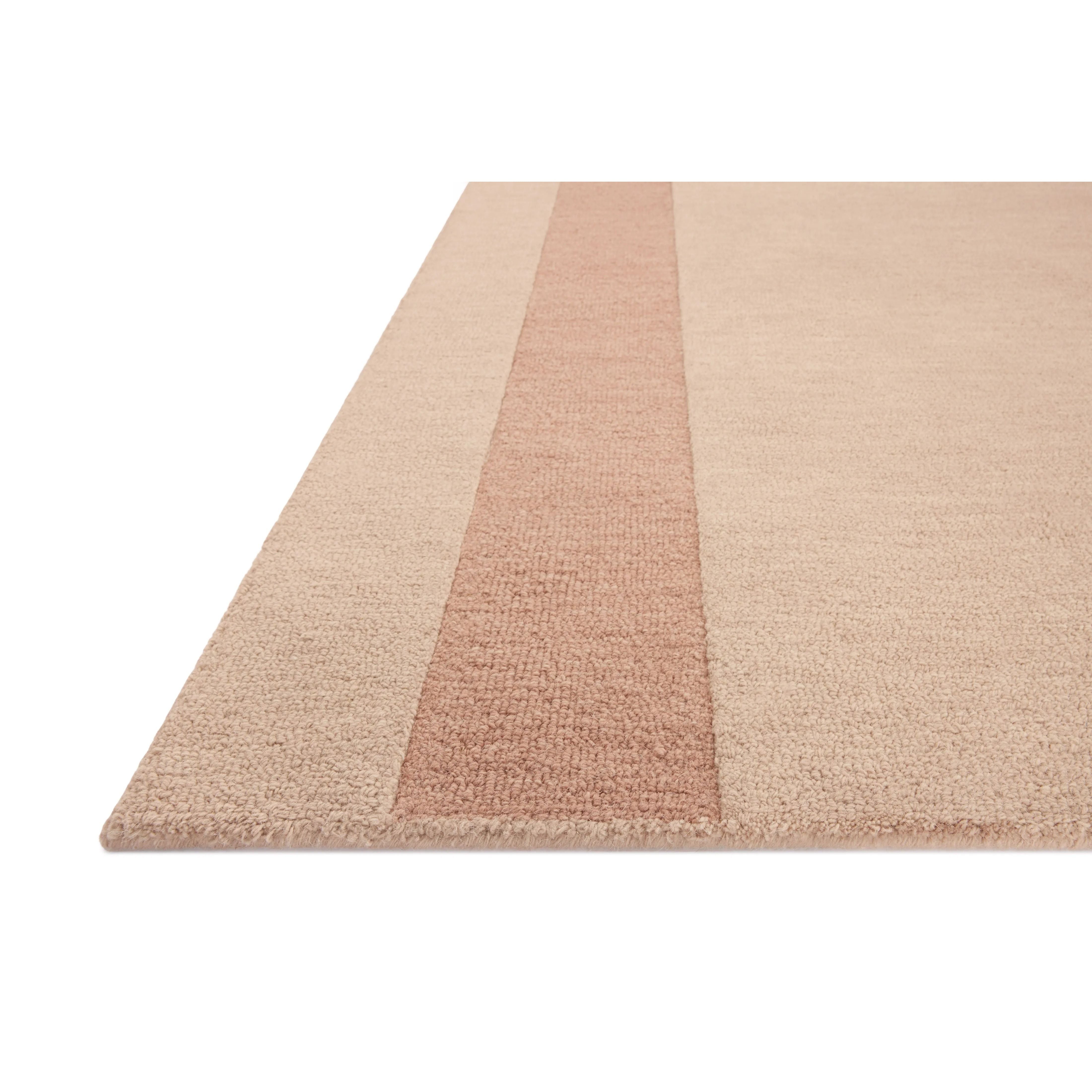 The Craven Collection is a hand-tufted area rug based on designs by Leanne Ford and made in collaboration with Loloi. Ford sketched classic stripes and checkerboards with an organic, free-flowing hand. The design comes to life with subtle space-dyed wool in creamy neutrals and rich, earthy tones. Amethyst Home provides interior design, new home construction design consulting, vintage area rugs, and lighting in the Scottsdale metro area.