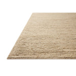 The Lennox Collection by Leanne Ford x Loloi is a statement area rug made with natural undyed wool that reveals subtle color differentiation in creamy neutral tones. The rug is hand-woven with a labor-intensive soumak weave, alternating rows of thick and thin looped yarns for an organic, inviting texture. Amethyst Home provides interior design, new home construction design consulting, vintage area rugs, and lighting in the San Diego metro area.