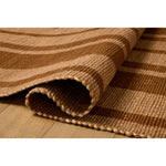 The Weatherstaff Collection is a vertically striped jute area rug with an organic look and feel, designed by Leanne Ford x Loloi. The earth-toned area rug features flatwoven jute that creates a ribbed texture horizontally, with stripes that are vertical—a playful combination. Amethyst Home provides interior design, new home construction design consulting, vintage area rugs, and lighting in the Omaha metro area.