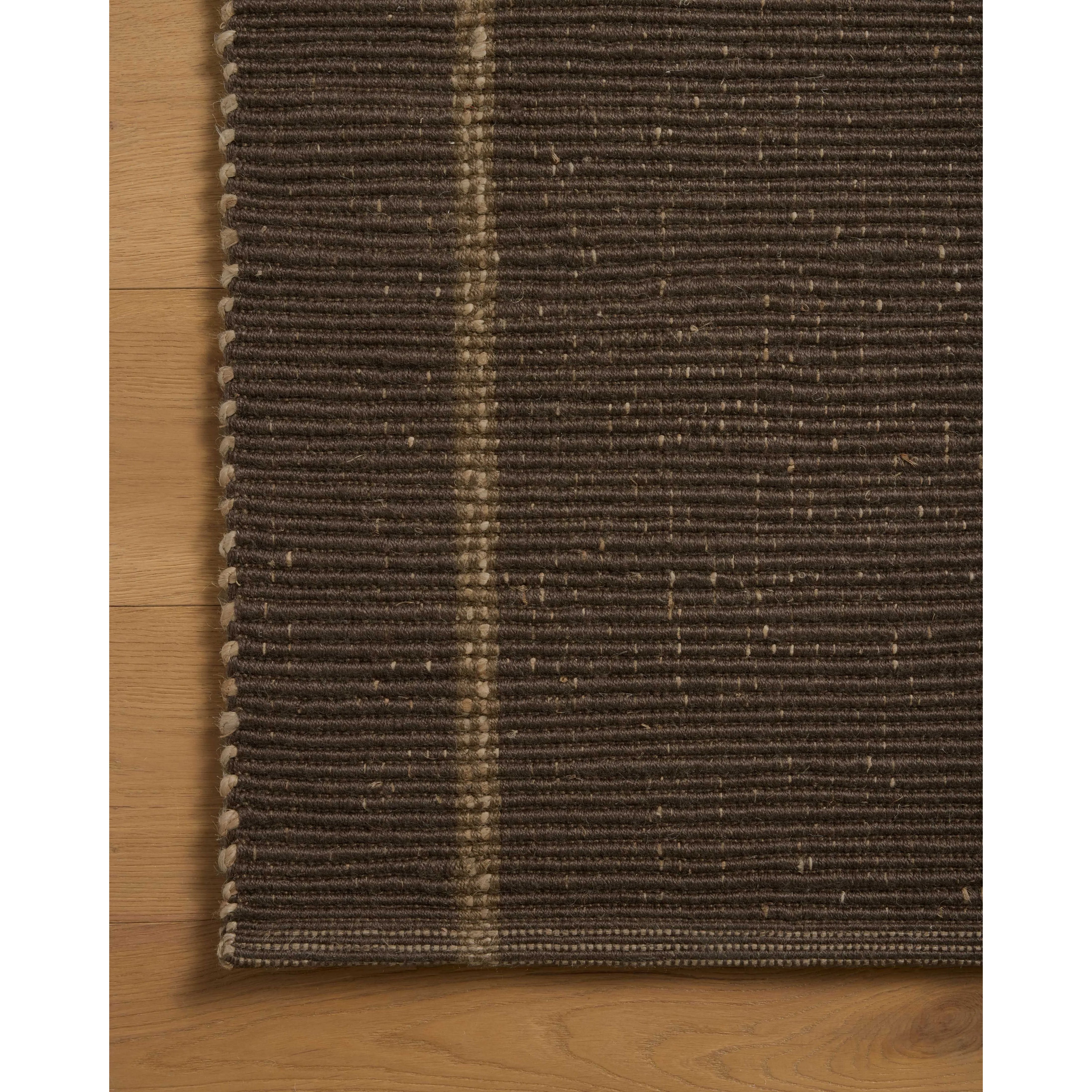 The Weatherstaff Collection is a vertically striped jute area rug with an organic look and feel, designed by Leanne Ford x Loloi. The earth-toned area rug features flatwoven jute that creates a ribbed texture horizontally, with stripes that are vertical—a playful combination. Amethyst Home provides interior design, new home construction design consulting, vintage area rugs, and lighting in the Laguna Beach metro area.