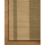 The Weatherstaff Collection is a vertically striped jute area rug with an organic look and feel, designed by Leanne Ford x Loloi. The earth-toned area rug features flatwoven jute that creates a ribbed texture horizontally, with stripes that are vertical—a playful combination. Amethyst Home provides interior design, new home construction design consulting, vintage area rugs, and lighting in the Charlotte metro area.