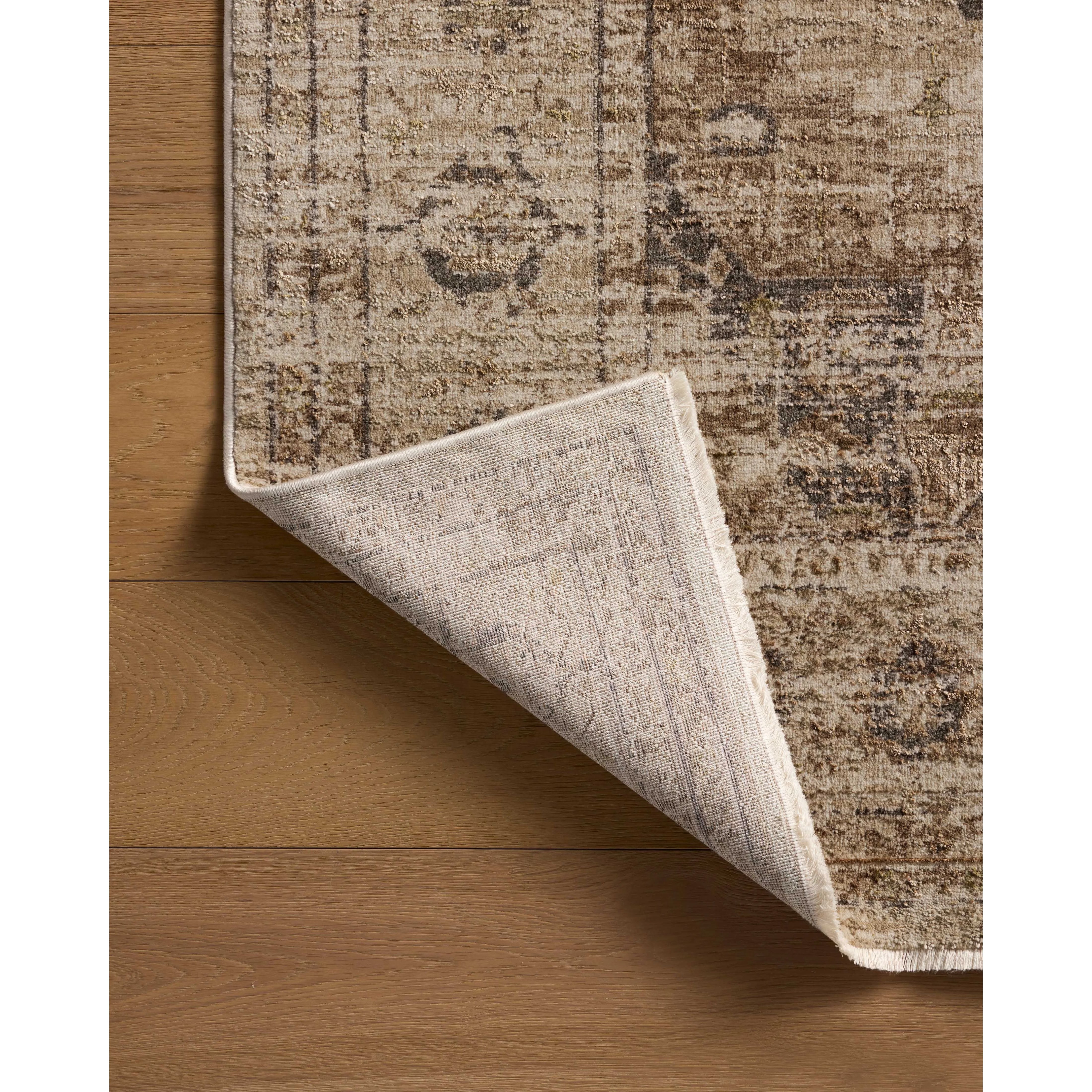 The Haywood Collection is an easy-to-clean, earth-toned area rug with a subtly distressed traditional design. Haywood is power-loomed of polyester in Turkey, a durable area rug for a living room, bedroom, dining room, or other high-traffic spaces. Amethyst Home provides interior design, new home construction design consulting, vintage area rugs, and lighting in the Miami metro area.