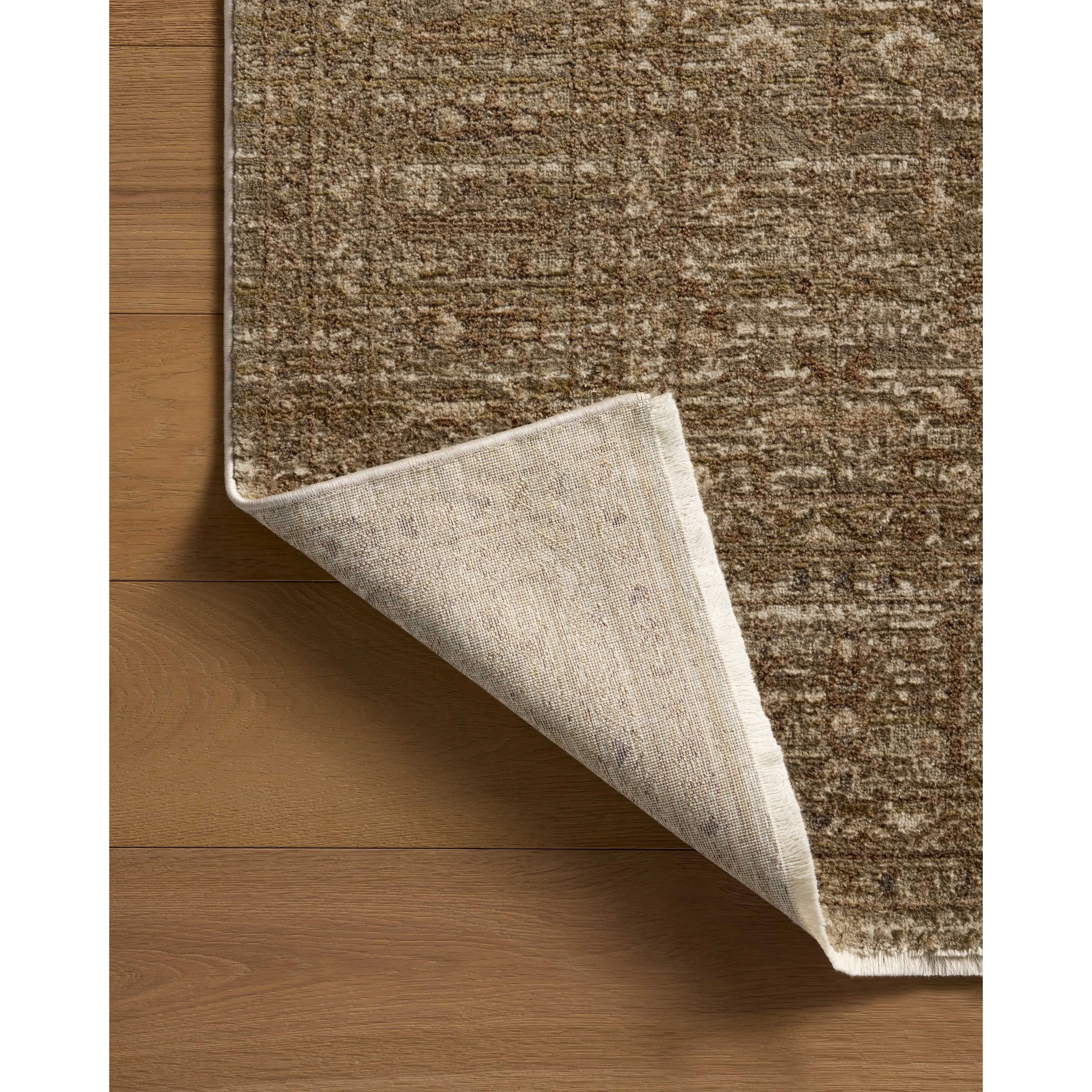 The Haywood Collection is an easy-to-clean, earth-toned area rug with a subtly distressed traditional design. Haywood is power-loomed of polyester in Turkey, a durable area rug for a living room, bedroom, dining room, or other high-traffic spaces. Amethyst Home provides interior design, new home construction design consulting, vintage area rugs, and lighting in the Winter Garden metro area.