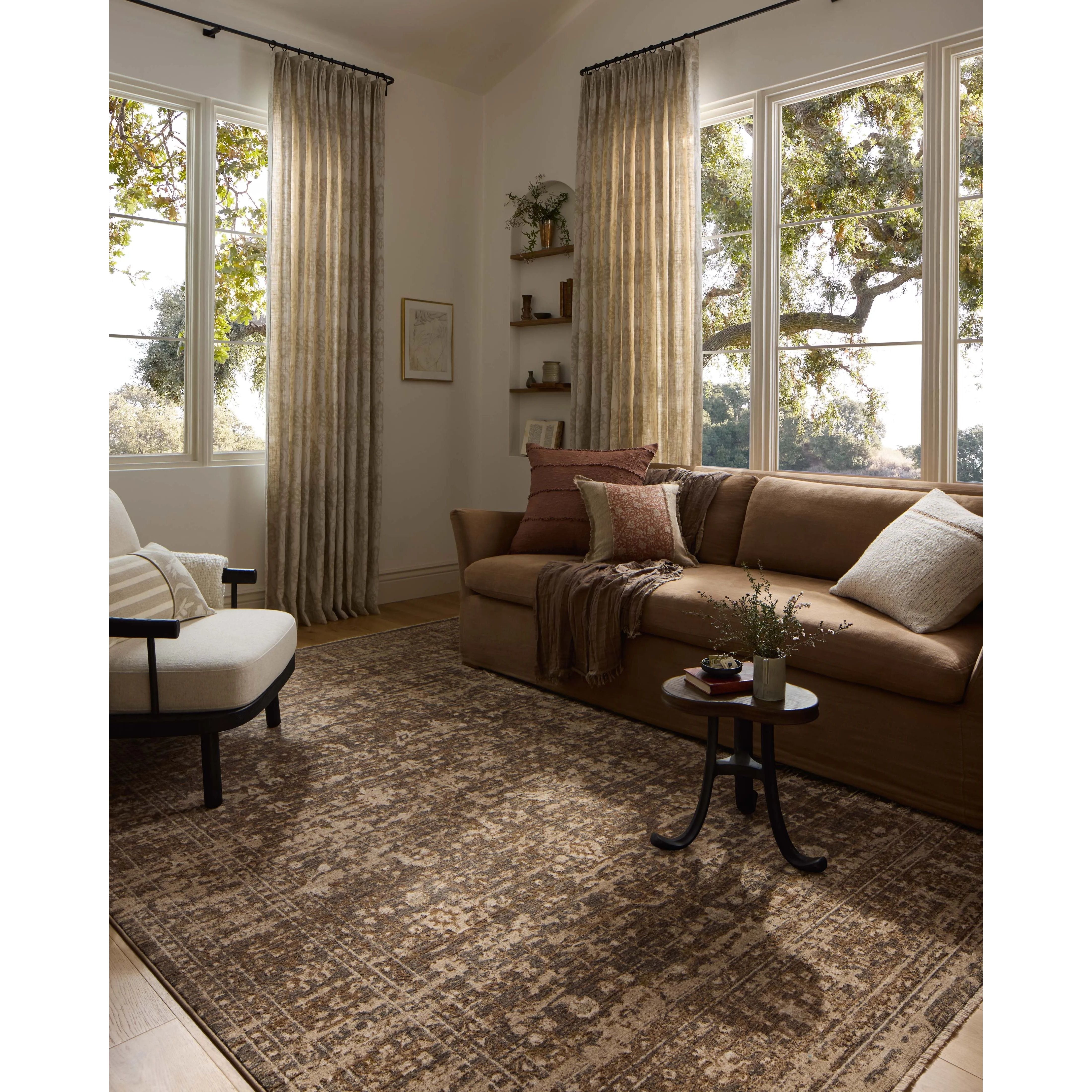 The Haywood Collection is an easy-to-clean, earth-toned area rug with a subtly distressed traditional design. Haywood is power-loomed of polyester in Turkey, a durable area rug for a living room, bedroom, dining room, or other high-traffic spaces. Amethyst Home provides interior design, new home construction design consulting, vintage area rugs, and lighting in the Portland metro area.