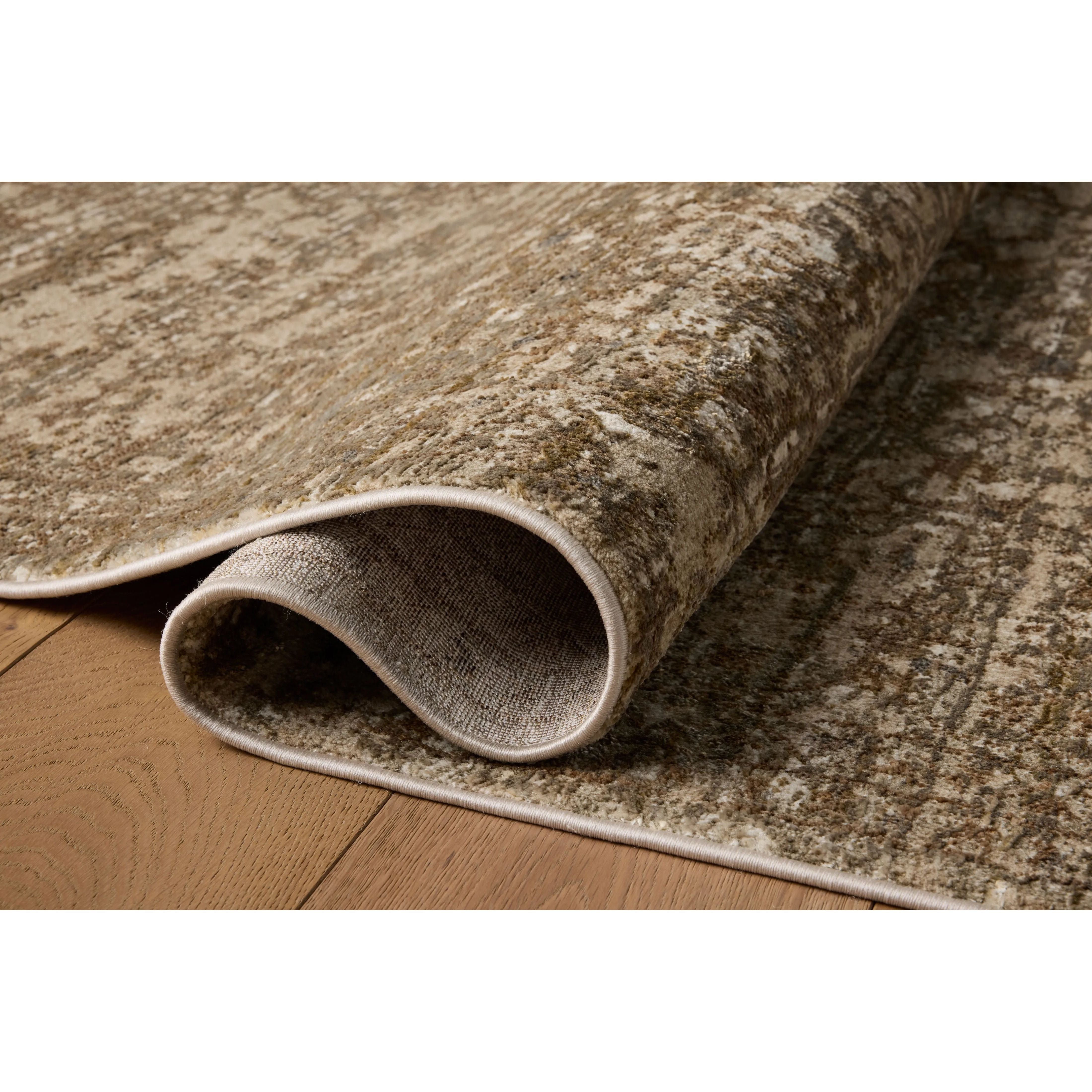 The Haywood Collection is an easy-to-clean, earth-toned area rug with a subtly distressed traditional design. Haywood is power-loomed of polyester in Turkey, a durable area rug for a living room, bedroom, dining room, or other high-traffic spaces. Amethyst Home provides interior design, new home construction design consulting, vintage area rugs, and lighting in the Park City metro area.