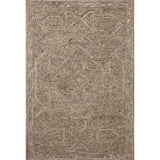 The Mabel Collection is a chunky wool area rug with a modernized take on traditional Turkish design. The rugs pattern rises with a higher pile for added dimension, while the neutral stone palette makes it easy to style in living rooms, bedrooms, and more. Amethyst Home provides interior design, new home construction design consulting, vintage area rugs, and lighting in the Kansas City metro area.