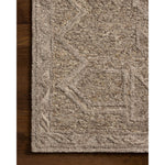 The Mabel Collection is a chunky wool area rug with a modernized take on traditional Turkish design. The rugs pattern rises with a higher pile for added dimension, while the neutral stone palette makes it easy to style in living rooms, bedrooms, and more. Amethyst Home provides interior design, new home construction design consulting, vintage area rugs, and lighting in the San Diego metro area.