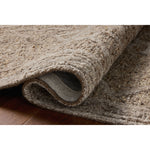 The Mabel Collection is a chunky wool area rug with a modernized take on traditional Turkish design. The rugs pattern rises with a higher pile for added dimension, while the neutral stone palette makes it easy to style in living rooms, bedrooms, and more. Amethyst Home provides interior design, new home construction design consulting, vintage area rugs, and lighting in the Scottsdale metro area.