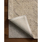 The Mabel Collection is a chunky wool area rug with a modernized take on traditional Turkish design. The rugs pattern rises with a higher pile for added dimension, while the neutral stone palette makes it easy to style in living rooms, bedrooms, and more. Amethyst Home provides interior design, new home construction design consulting, vintage area rugs, and lighting in the Des Moines metro area.