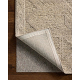 The Mabel Collection is a chunky wool area rug with a modernized take on traditional Turkish design. The rugs pattern rises with a higher pile for added dimension, while the neutral stone palette makes it easy to style in living rooms, bedrooms, and more. Amethyst Home provides interior design, new home construction design consulting, vintage area rugs, and lighting in the Des Moines metro area.