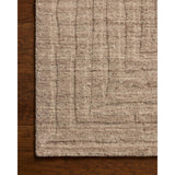 The Maren Collection is a unique handmade area rug made with a new technique that creates a dotted texture, almost like fine embroidery, but with a substantial hand-loomed feel. The pile reveals modern geometric patterns with organic shapes and natural softness, available in light, easygoing neutrals. Amethyst Home provides interior design, new home construction design consulting, vintage area rugs, and lighting in the Tampa metro area.