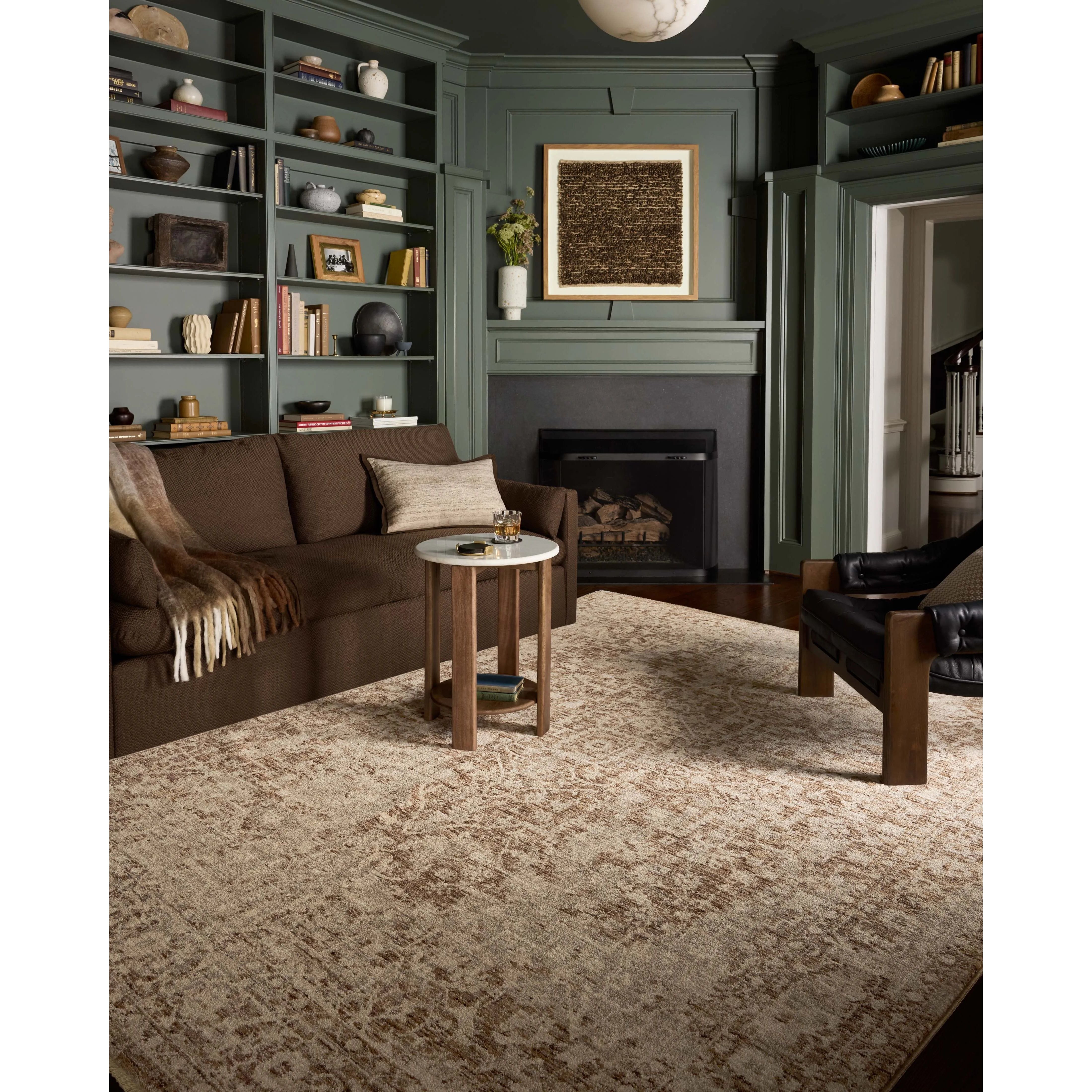 The Newman Collection is a power-loomed area rug made of soft space-dyed polyester, which lends a subtle gradation of color in an easy-to-clean, no-shed construction. The versatile, vintage-inspired design features distressed white motifs against lovely and light tonal backgrounds. Amethyst Home provides interior design, new home construction design consulting, vintage area rugs, and lighting in the Salt Lake City metro area.
