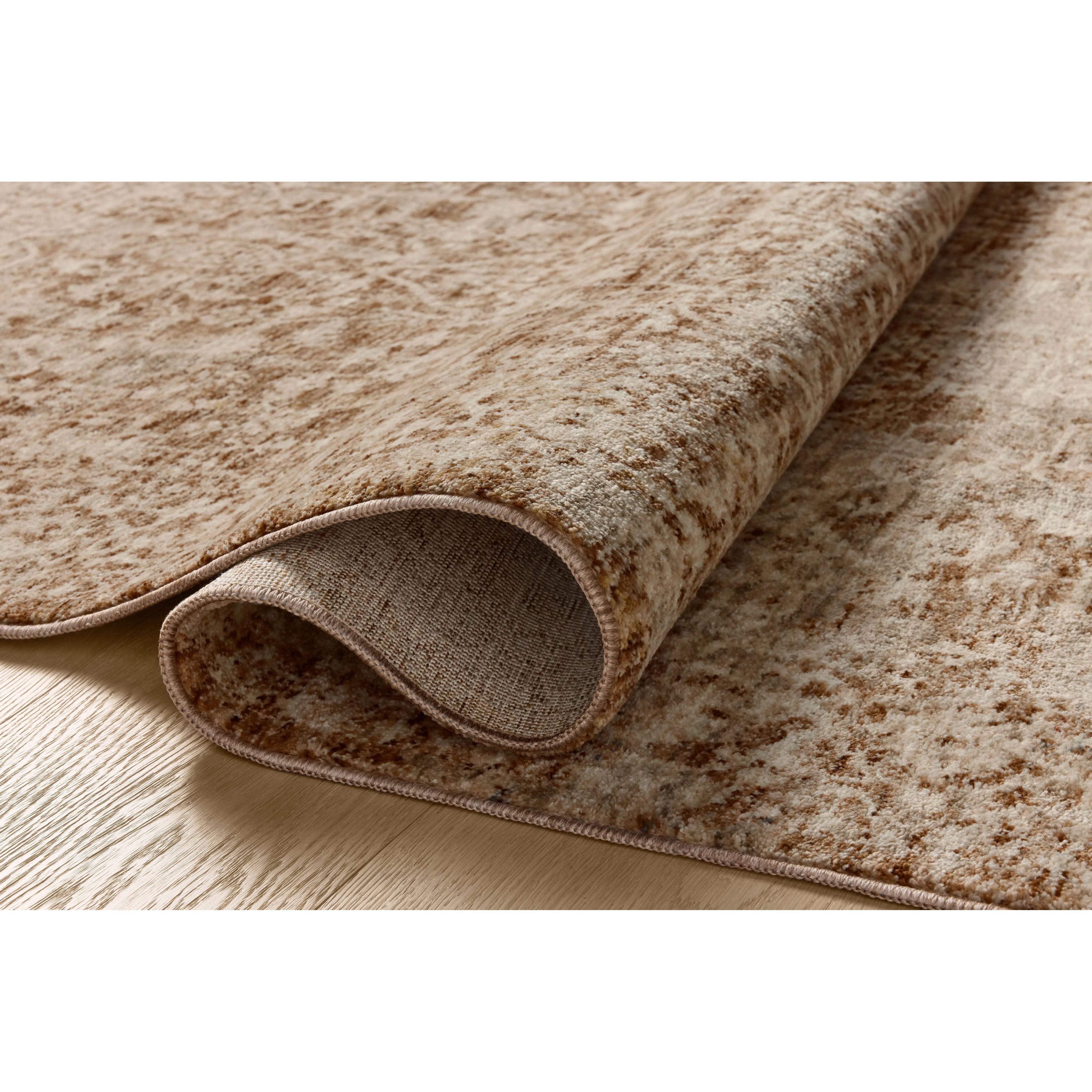The Newman Collection is a power-loomed area rug made of soft space-dyed polyester, which lends a subtle gradation of color in an easy-to-clean, no-shed construction. The versatile, vintage-inspired design features distressed white motifs against lovely and light tonal backgrounds. Amethyst Home provides interior design, new home construction design consulting, vintage area rugs, and lighting in the Seattle metro area.