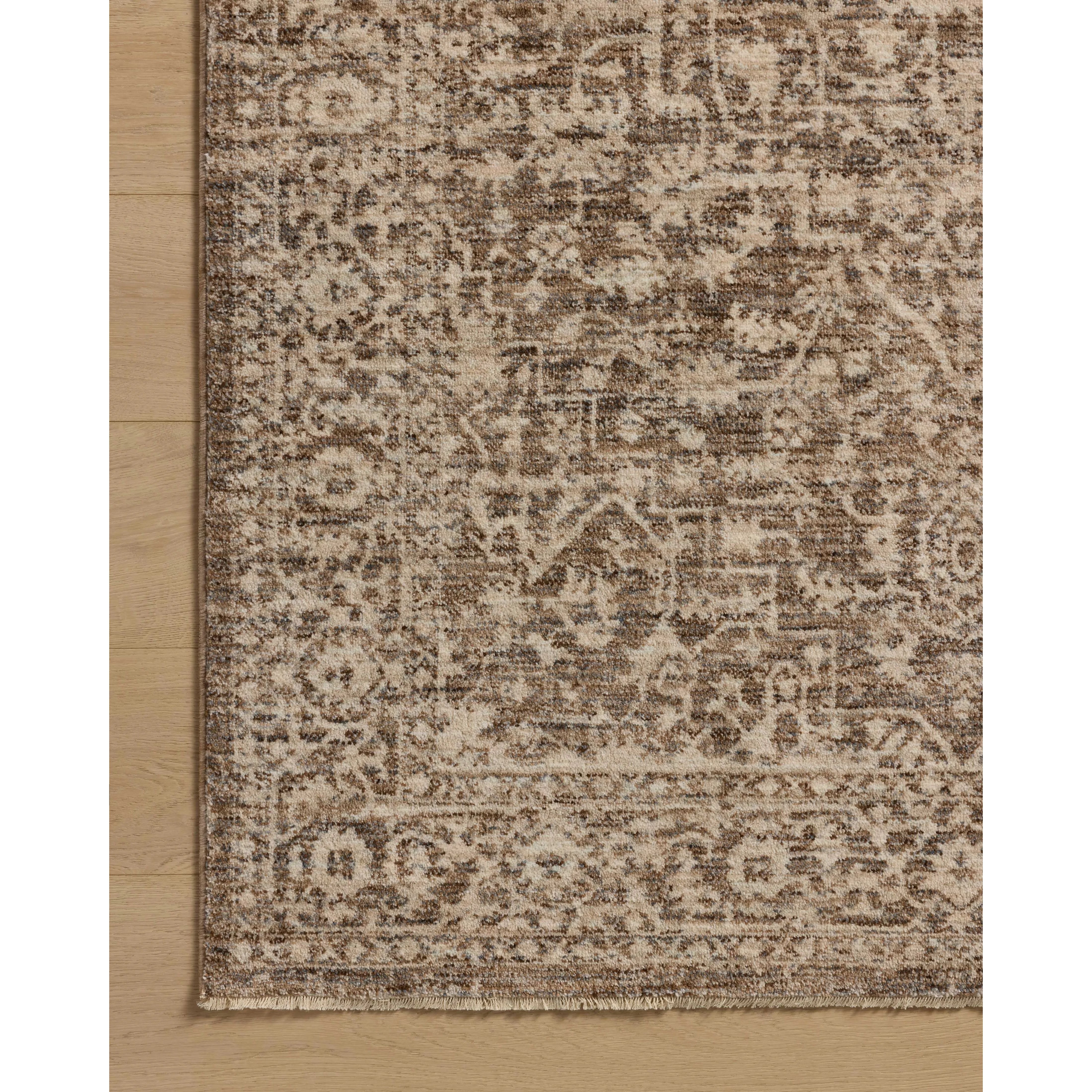 The Newman Collection is a power-loomed area rug made of soft space-dyed polyester, which lends a subtle gradation of color in an easy-to-clean, no-shed construction. The versatile, vintage-inspired design features distressed white motifs against lovely and light tonal backgrounds. Amethyst Home provides interior design, new home construction design consulting, vintage area rugs, and lighting in the Alpharetta metro area.