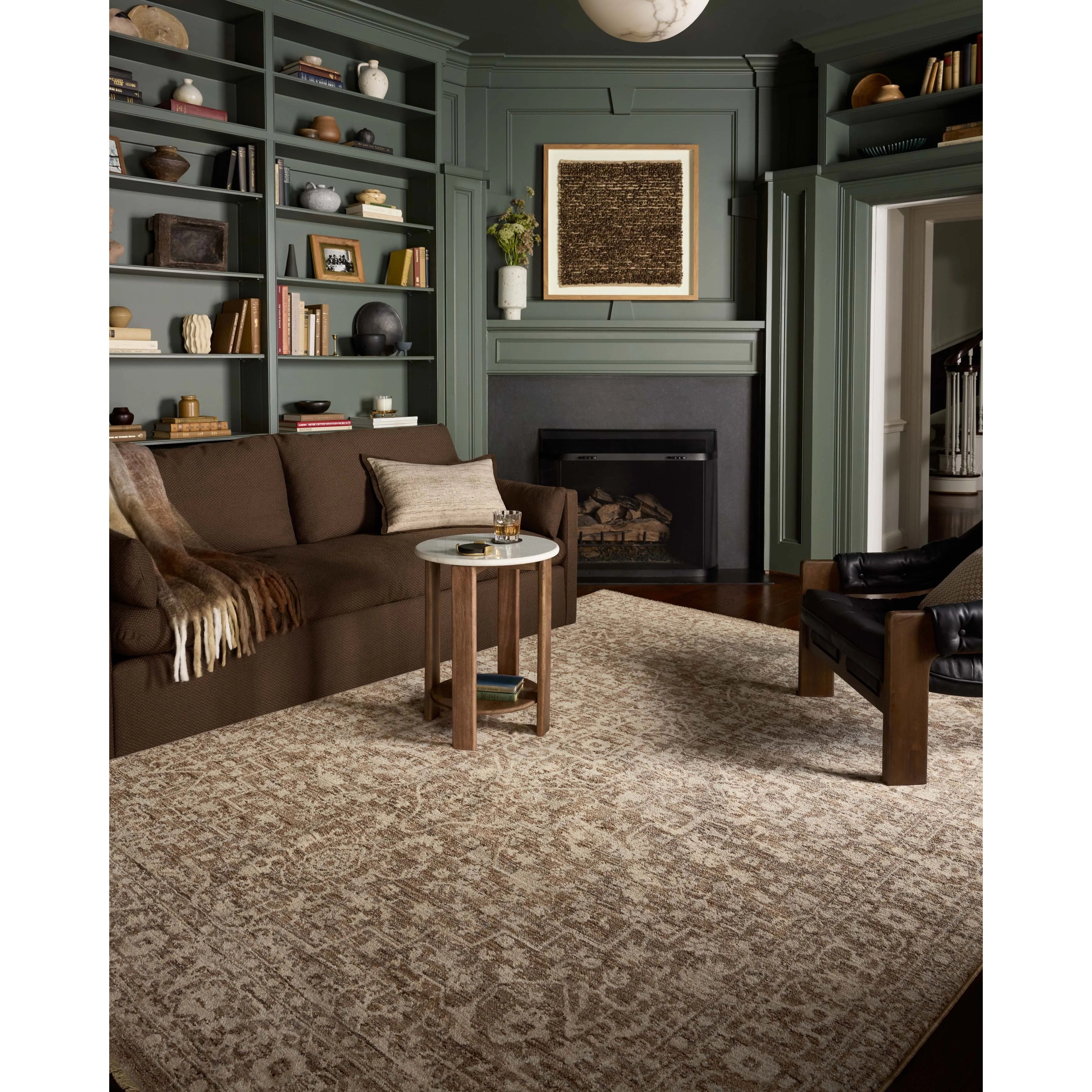 The Newman Collection is a power-loomed area rug made of soft space-dyed polyester, which lends a subtle gradation of color in an easy-to-clean, no-shed construction. The versatile, vintage-inspired design features distressed white motifs against lovely and light tonal backgrounds. Amethyst Home provides interior design, new home construction design consulting, vintage area rugs, and lighting in the Seattle metro area.