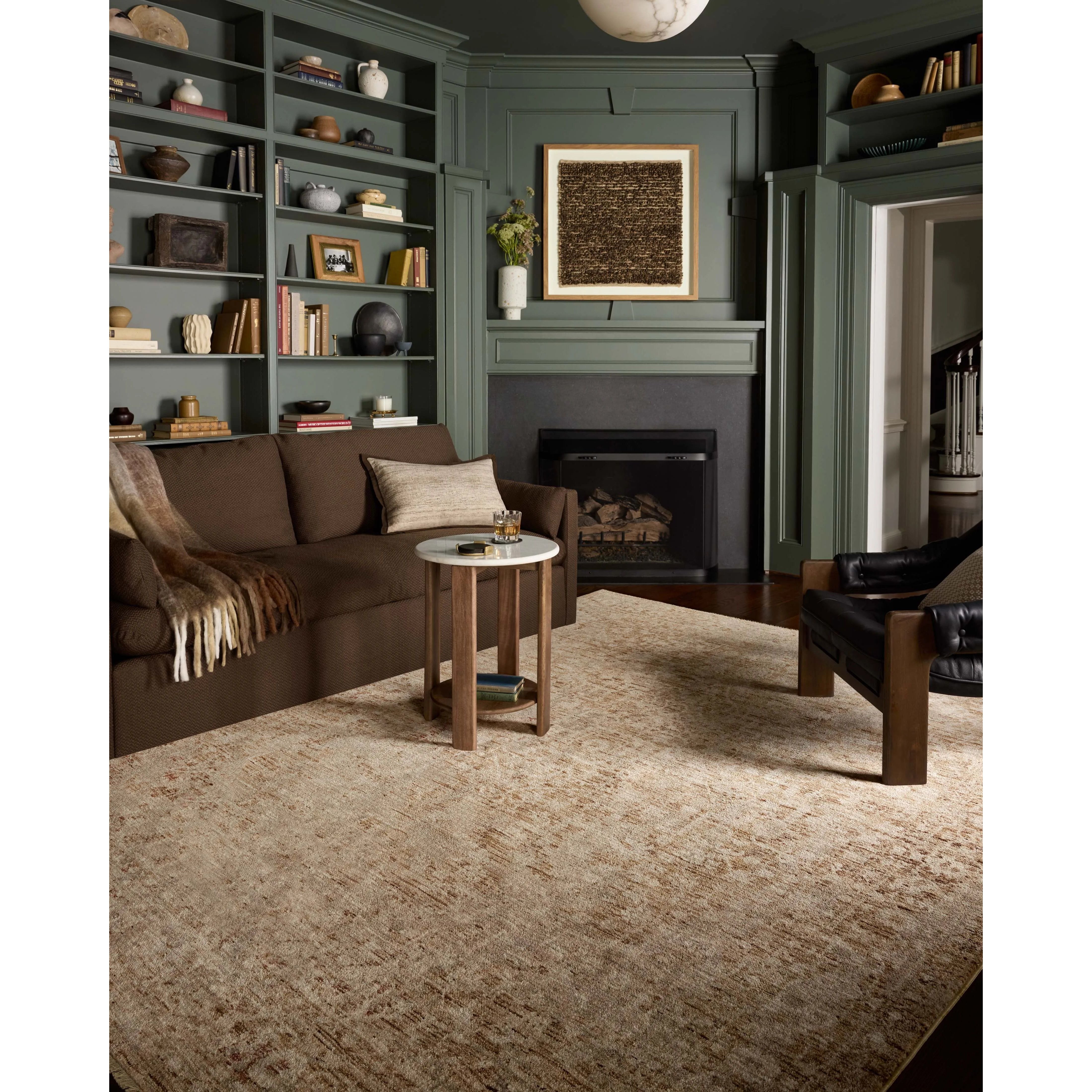 The Newman Collection is a power-loomed area rug made of soft space-dyed polyester, which lends a subtle gradation of color in an easy-to-clean, no-shed construction. The versatile, vintage-inspired design features distressed white motifs against lovely and light tonal backgrounds. Amethyst Home provides interior design, new home construction design consulting, vintage area rugs, and lighting in the Dallas metro area.