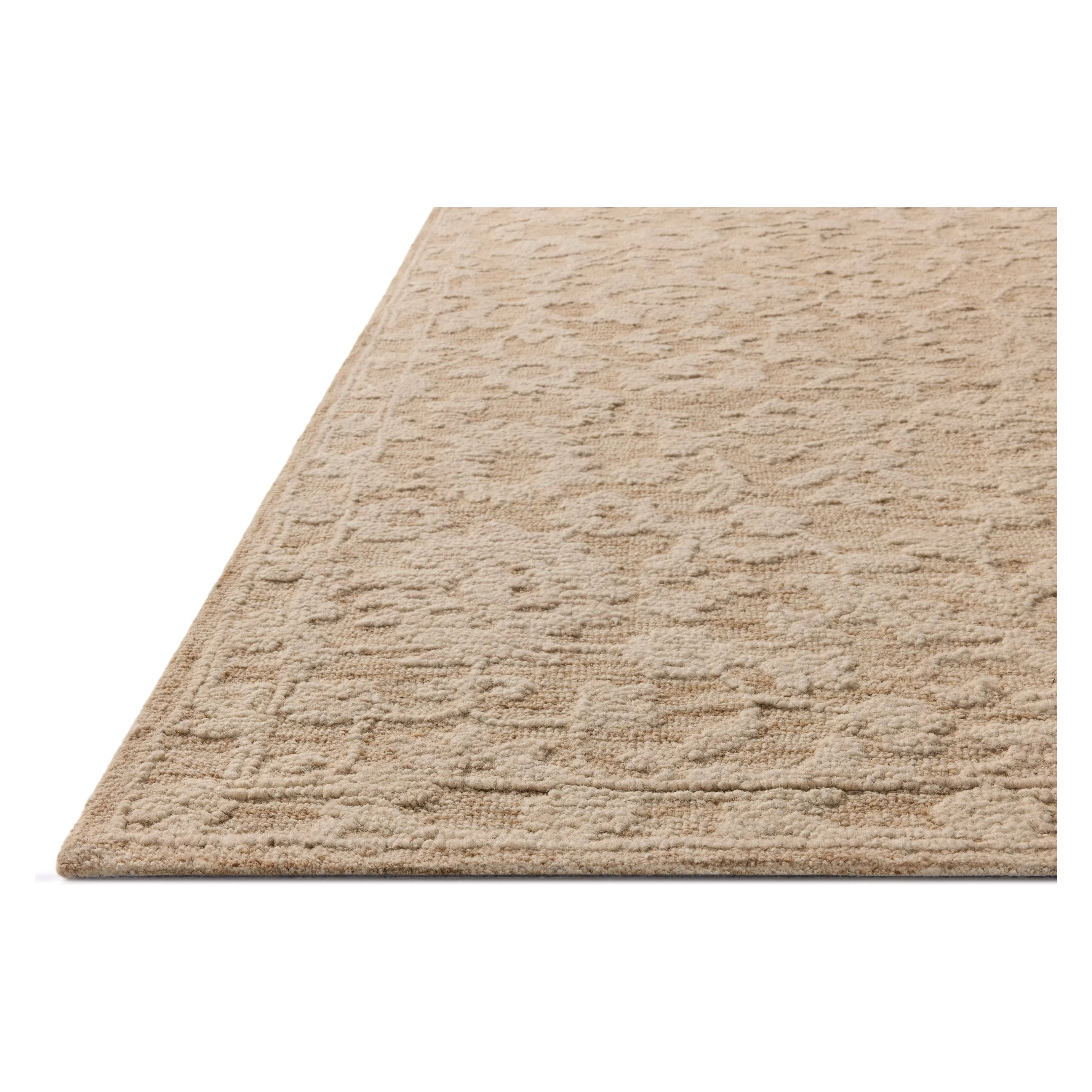 The Prudence Collection is a hand-tufted area rug made of soft, space-dyed wool and cotton, which lends a subtle gradation of color throughout the floral design. The rugs background is low-looped, while the pattern is made with a chunky, higher loop to create even more depth in this sophisticated design. Amethyst Home provides interior design, new home construction design consulting, vintage area rugs, and lighting in the Washington metro area.
