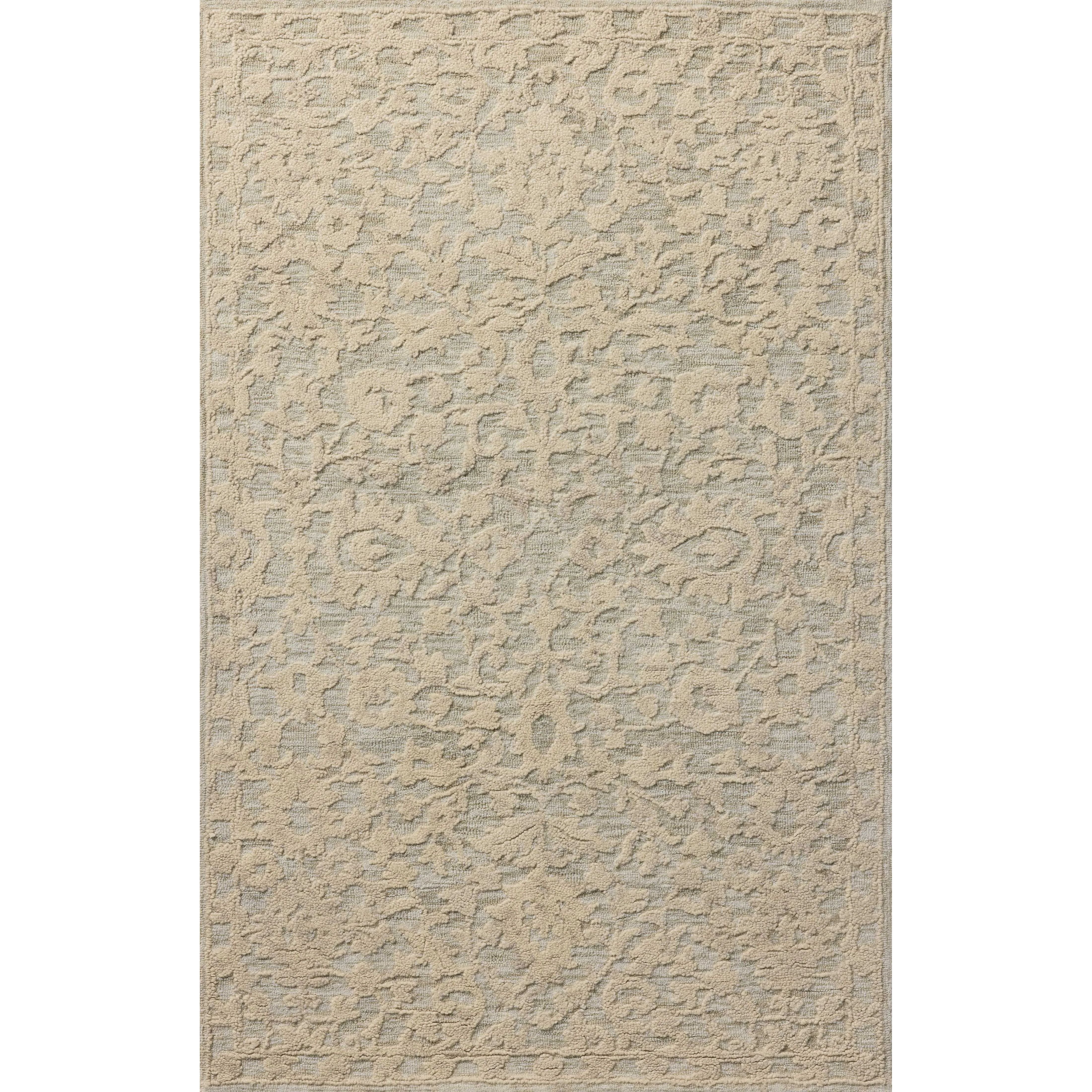 The Prudence Collection is a hand-tufted area rug made of soft, space-dyed wool and cotton, which lends a subtle gradation of color throughout the floral design. The rugs background is low-looped, while the pattern is made with a chunky, higher loop to create even more depth in this sophisticated design. Amethyst Home provides interior design, new home construction design consulting, vintage area rugs, and lighting in the San Diego metro area.