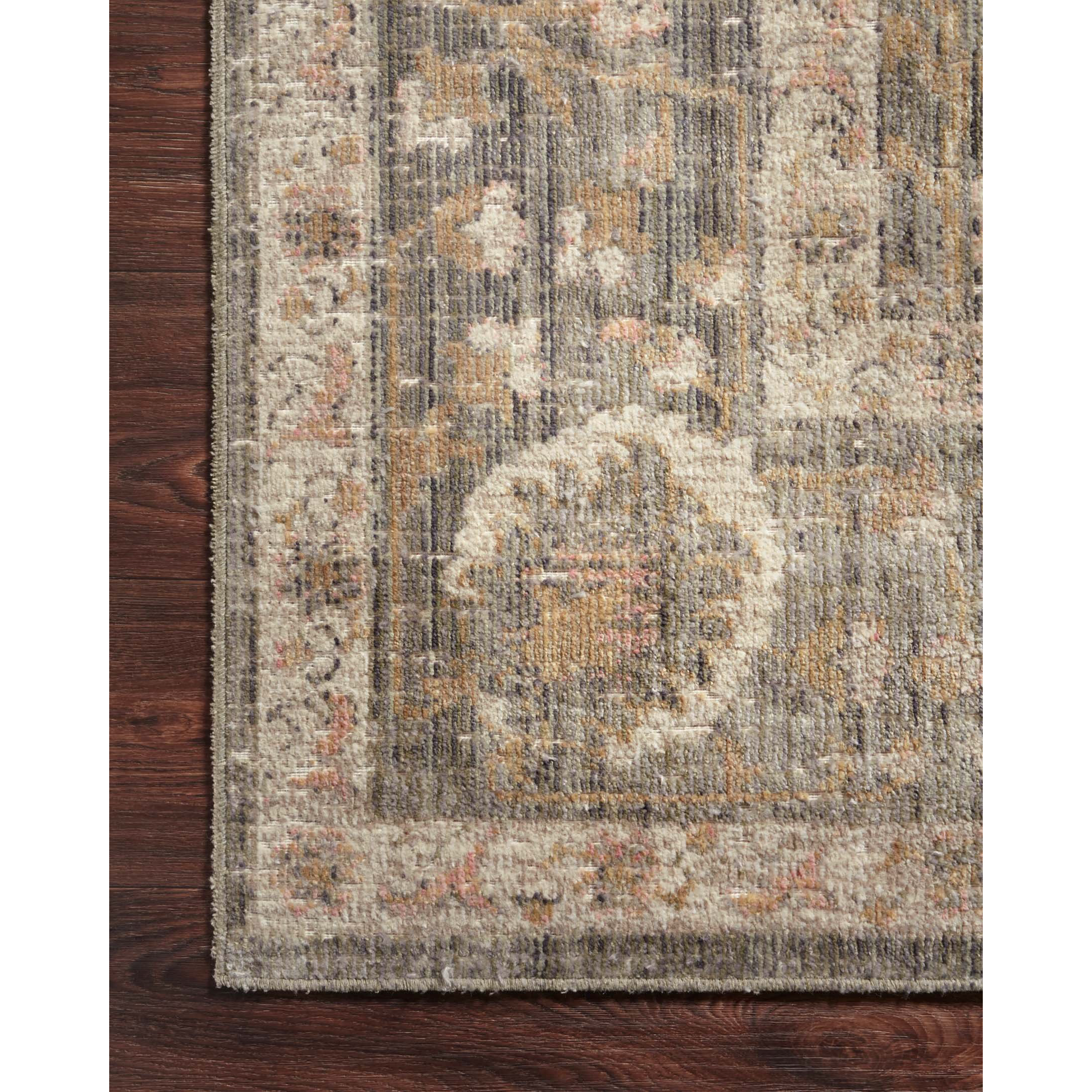 Durable, low pile, and soft underfoot, this rug is inspired by classic vintage and antique rugs. The Rosemarie Chris Loves Julia Sage / Blush ROE-01 rug from Loloi features a beautiful vintage pattern and patina. The rug is easy to clean, never sheds, and perfect for living rooms, dining rooms, hallways, and kitchens!