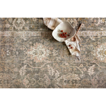 Durable, low pile, and soft underfoot, this rug is inspired by classic vintage and antique rugs. The Rosemarie Chris Loves Julia Sage / Blush ROE-01 rug from Loloi features a beautiful vintage pattern and patina. The rug is easy to clean, never sheds, and perfect for living rooms, dining rooms, hallways, and kitchens!