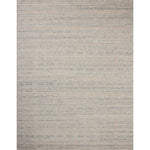 The Sonya Mist / Oatmeal Rug is a hand-loomed area rug with a light, airy palette and understated graphic design. The rug’s textural pile is a soft blend of wool and nylon that creates dimension in living rooms, bedrooms, and more. Amethyst Home provides interior design, new home construction design consulting, vintage area rugs, and lighting in the Monterey metro area.