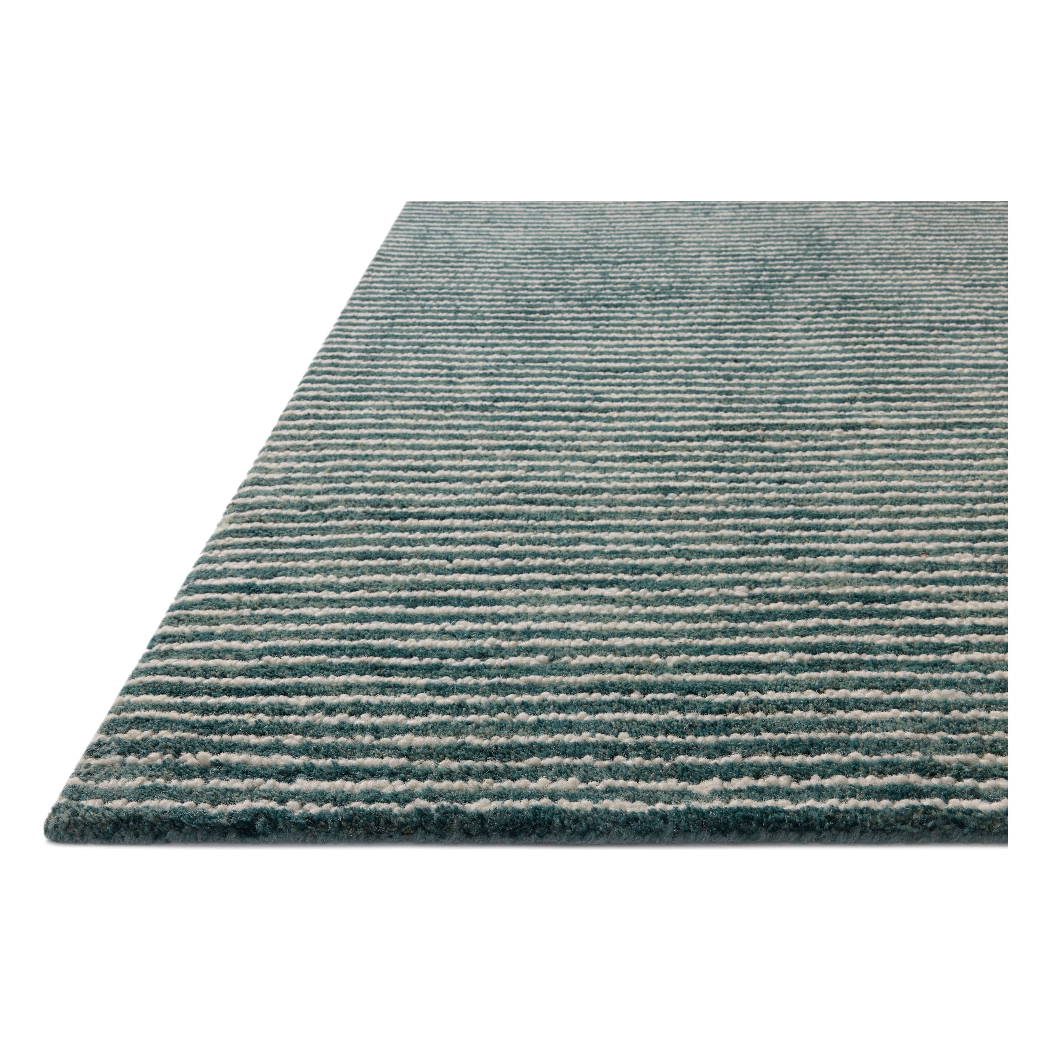 The Sunday Collection is a home-friendly, hand-tufted area rug with a pinstripe pattern in varied, vibrant tones. The rugs textured pile brings even more dimension and depth to this classic yet playful design. Amethyst Home provides interior design, new home construction design consulting, vintage area rugs, and lighting in the Calabasas metro area.