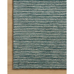 The Sunday Collection is a home-friendly, hand-tufted area rug with a pinstripe pattern in varied, vibrant tones. The rugs textured pile brings even more dimension and depth to this classic yet playful design. Amethyst Home provides interior design, new home construction design consulting, vintage area rugs, and lighting in the Los Angeles metro area.