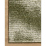 The Sunday Collection is a home-friendly, hand-tufted area rug with a pinstripe pattern in varied, vibrant tones. The rugs textured pile brings even more dimension and depth to this classic yet playful design. Amethyst Home provides interior design, new home construction design consulting, vintage area rugs, and lighting in the Miami metro area.