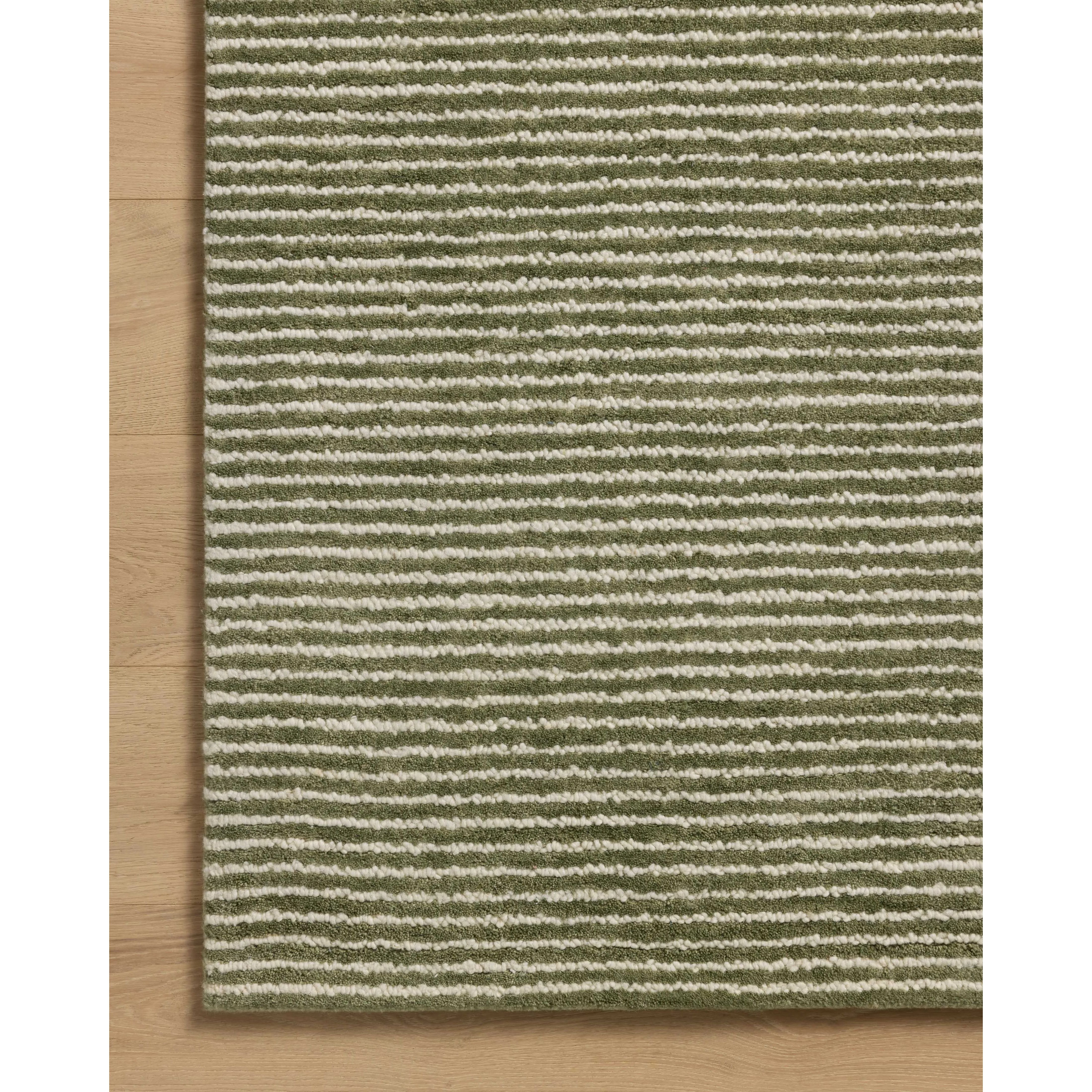 The Sunday Collection is a home-friendly, hand-tufted area rug with a pinstripe pattern in varied, vibrant tones. The rugs textured pile brings even more dimension and depth to this classic yet playful design. Amethyst Home provides interior design, new home construction design consulting, vintage area rugs, and lighting in the Miami metro area.