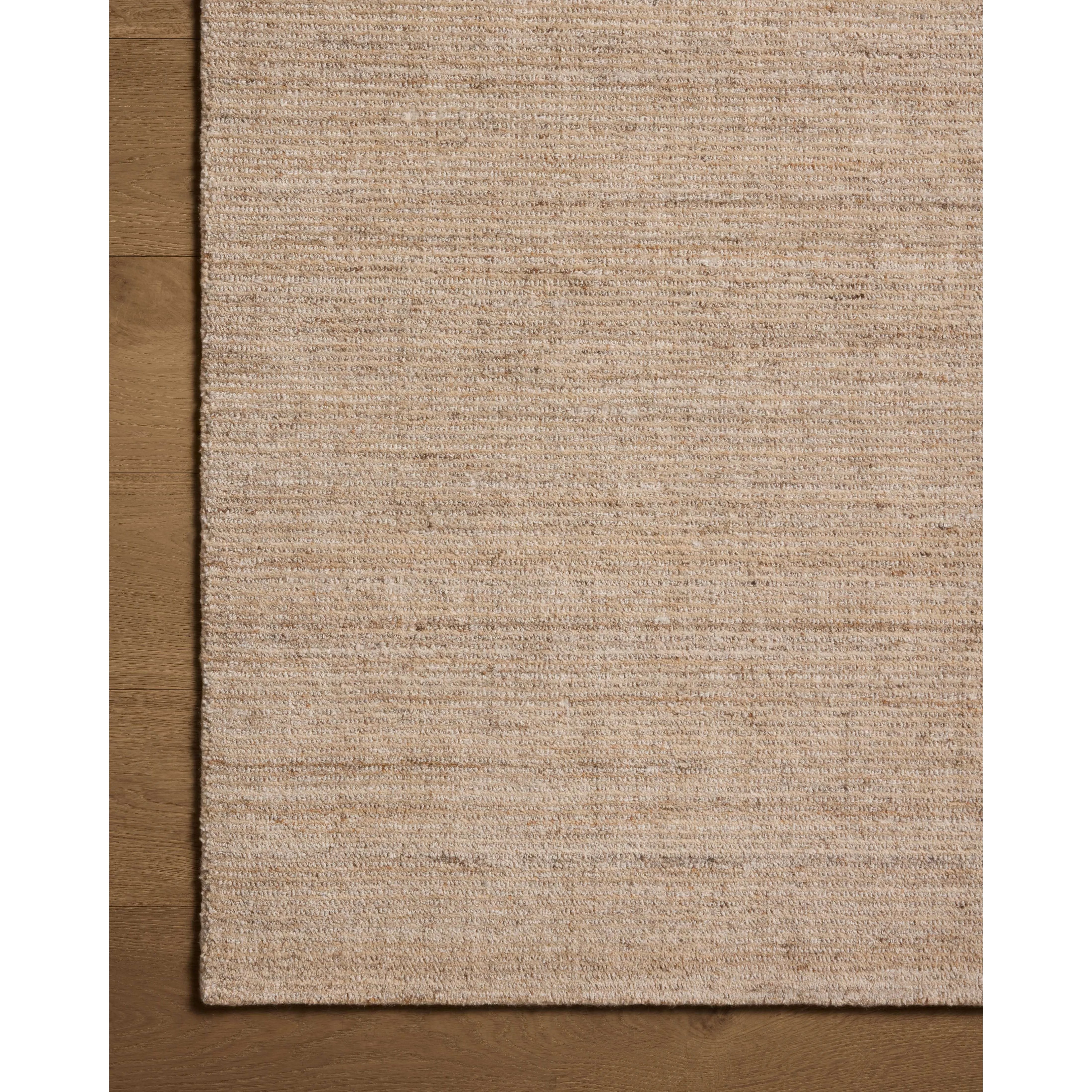 The Thorne Collection is a hand-loomed area rug with thin, textured lines. The rug's neutral, heathered tones add levity to living rooms, coziness to bedrooms, and casual warmth to dining rooms. Amethyst Home provides interior design, new home construction design consulting, vintage area rugs, and lighting in the Omaha metro area.