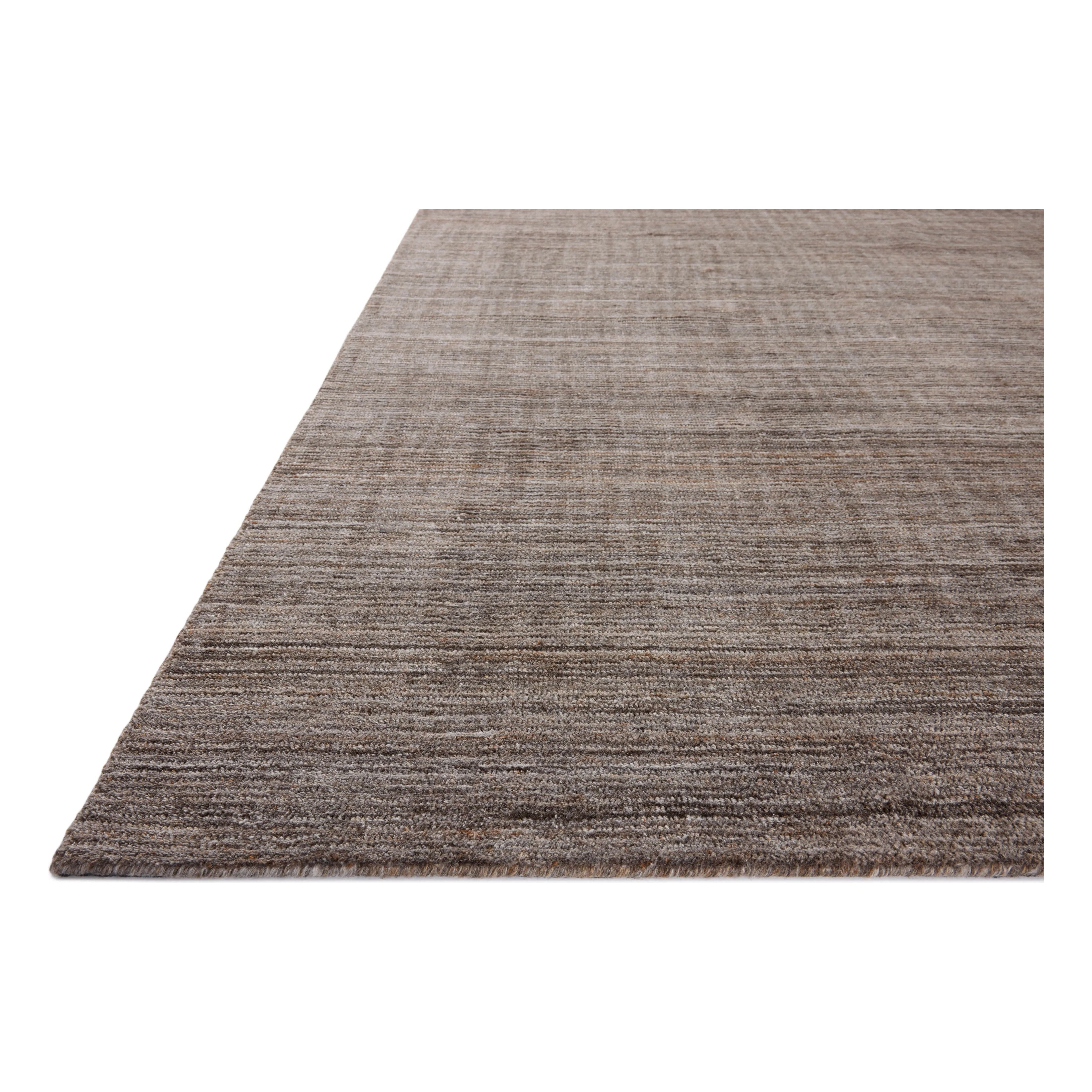 The Thorne Collection is a hand-loomed area rug with thin, textured lines. The rug's neutral, heathered tones add levity to living rooms, coziness to bedrooms, and casual warmth to dining rooms. Amethyst Home provides interior design, new home construction design consulting, vintage area rugs, and lighting in the Scottsdale metro area.