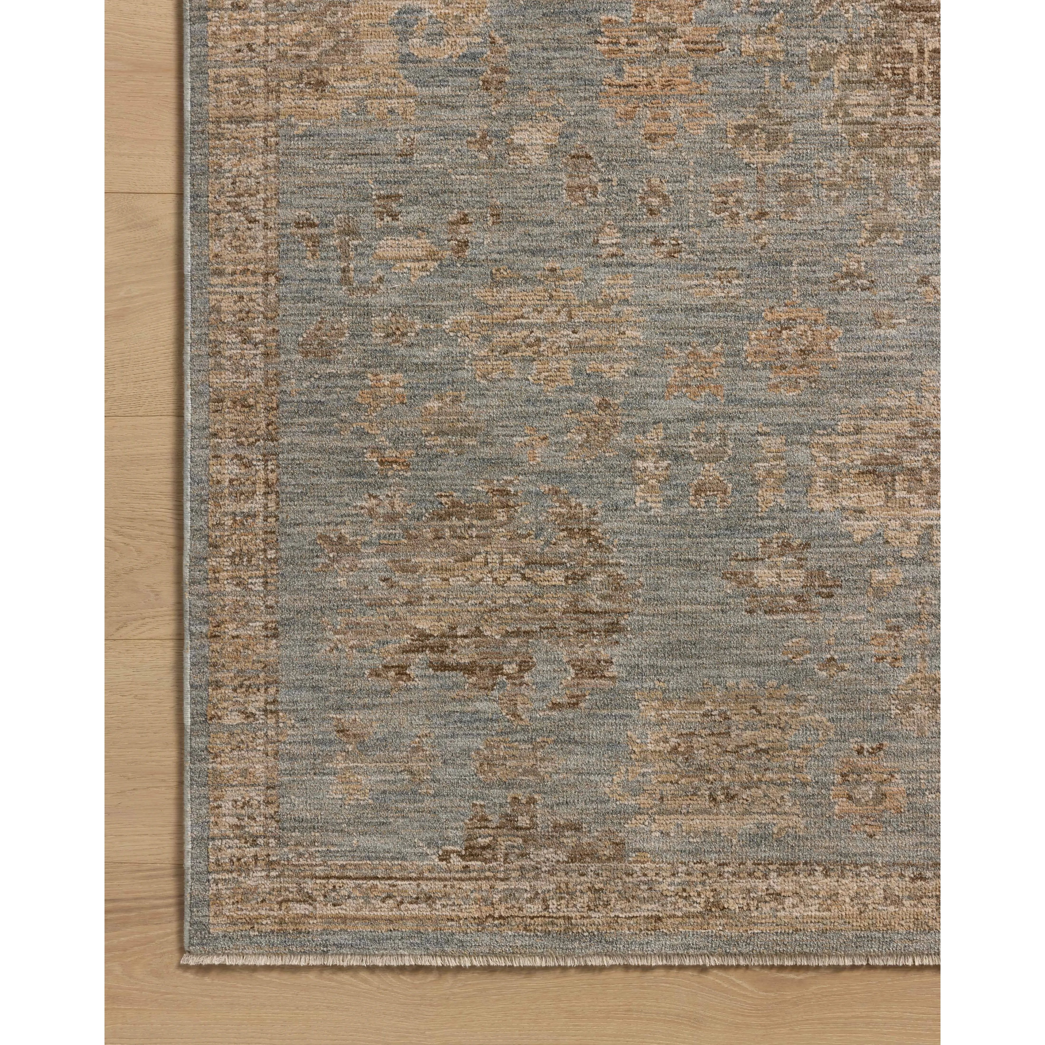 The Willa Collection is a power-loomed area rug based on traditional Turkish motifs that ebb and flow across the design with the yarns shifting tones. The rugs vintage-style design and light palettes with tones of sand and pale sky is elegantly neutral for living rooms, bedrooms, hallways, and more. Amethyst Home provides interior design, new home construction design consulting, vintage area rugs, and lighting in the Washington metro area.