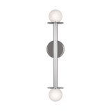 Featuring Nodes Double Sconce Polished Nickel by Visual Comfort at Amethyst Home. Nodes task, ceiling and wall lighting is minimal yet bold, highlighting Kelly's distinctive juxtaposition of mixed-materiality and curvilinear form. Light radiates from milk glass globes set against metal discs. All fixtures can be used or without the discs. The cast canopy is available in Burnished . Amethyst Home provides interior design, new construction, custom furniture, and area rugs in the Charlotte metro area