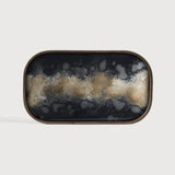A subdued color palette meets captivating motifs inspired by nature and travel. This Black Organic glass valet tray experiments with the balance between rich patterns offset with muted tones, revealing the beauty behind the deceivingly ordinary subjects from which inspiration is drawn. In doing so, this collection captures the essence of timelessness.
Weight : 2 lb Dimensions: 9. Amethyst Home provides interior design, new construction, custom furniture, and area rugs in the Calabasas metro area