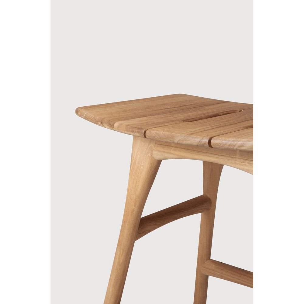 Featuring Osso No Cushion Teak Outdoor Stool by Ethnicraft at Amethyst Home. The beauty of balance and symmetry found in nature has inspired the Osso collection. This solid teak stool takes quality and comfortable seating design outdoors. Use with or without seat cushion.Weight : 8 lb Dimensions: 13 in W x 20 in L x 19.5 in HBrushed : NoCollection : OssoFloor Protector : YesMa. Amethyst Home provides interior design, new construction, custom furniture, and area rugs in the Winter Garden metro area