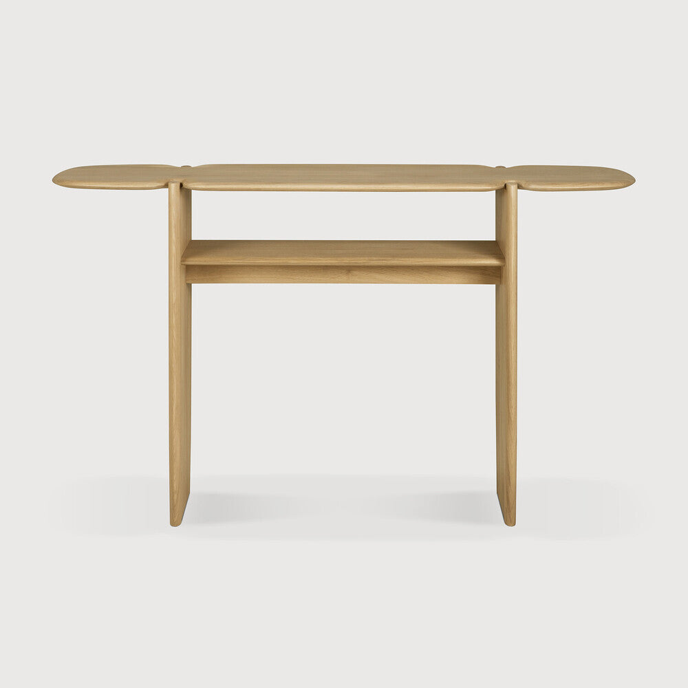 The PI collection honours nature’s design by keeping the strength, curves and lines, as nature intended. Interesting shapes are discovered in this sleek and stylish, polished imperfect, finish. Each PI item is finished by hand to ensure that the individual character of the wood is respected. The PI console provides a balanced space to store cherished mementos. Amethyst Home provides interior design, new construction, custom furniture, and area rugs in the Charlotte metro area