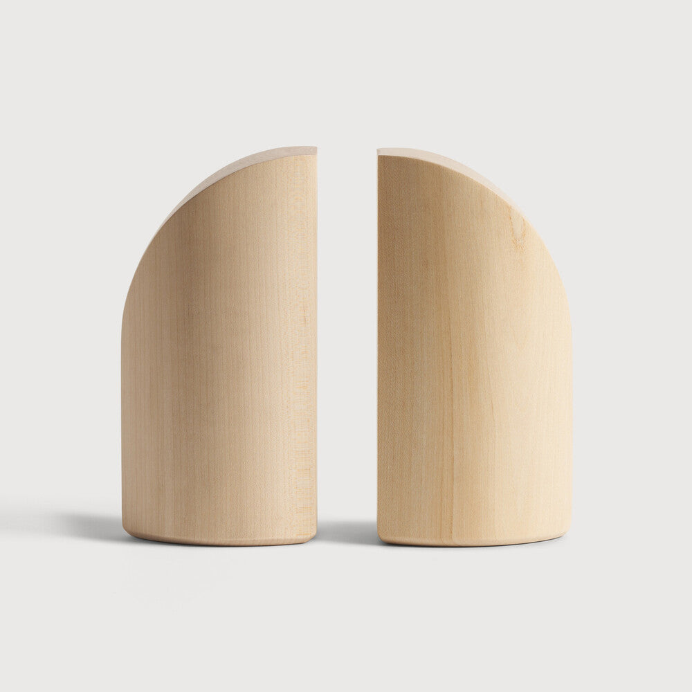 Featuring Pi Sycamore Book Ends by Ethnicraft at Amethyst Home. The PI collection honours nature’s design by keeping the strength, curves and lines, as nature intended. Each PI book end is finished by hand to ensure that the individual character of the wood is respected. Interesting shapes are discovered in this sleek and stylish, polished imperfect, finish. Designed by Alain . Amethyst Home provides interior design, new construction, custom furniture, and area rugs in the Newport Beach metro area