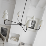 Featuring Piaf Grande Chandelier Aged Iron and Ebonized Oak by Visual Comfort at Amethyst Home. With the Piaf, Thomas O'Brien explores clean shapes with an airy feel. Natural steel bars intersect with wooden and metal hubs accented by simple candles and white conical shades. The juxtaposition of classic, casual forms with modern details will lend itself effortlessly to a diverse ra. Amethyst Home provides interior design, new construction, custom furniture, and area rugs in the Portland metro area