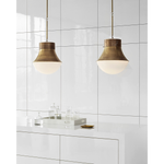Featuring Precision Large Pendant Antique-Burnished Brass by Visual Comfort at Amethyst Home. Defined by its signature perforated metal, Kelly Wearstler's Precision series explores the harmonious relationship between light and form. Featuring bold architectural lines that range from minimalist silhouettes to statement shapes, the modern designs diffuse and reflect light to add. Amethyst Home provides interior design, new construction, custom furniture, and area rugs in the Newport Beach metro area