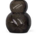 With its alluring silhouette, the Hugo ceramic table lamp brings contemporary appeal and modern contrast to interiors. Employing a specialized glazing technique, master artisans hand-shape earthenware to produce a luxurious finish for subtle highs and lows that shift with the light source above. Amethyst Home provides interior design, new home construction design consulting, vintage area rugs, and lighting in the Des Moines metro area.