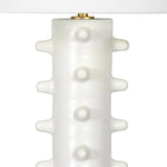 The Norway Ceramic Table Lamp is both modern and fun with its elongated hourglass base dotted with modern ceramic spikes, each formed and applied by hand. Finished with a crisp, natural linen shade and natural brass finial and neck, the Norway is the perfect addition to a living room or as a pair on bedside tables. Amethyst Home provides interior design, new home construction design consulting, vintage area rugs, and lighting in the Houston metro area.