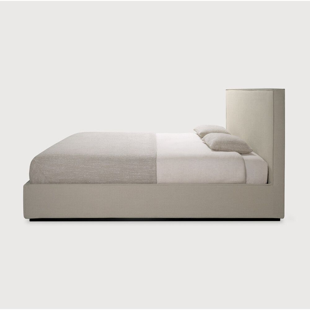 Featuring Revive Frame Only Linen Us King Headboard And Bed Frame by Ethnicraft at Amethyst Home. Find solace in the Revive bed, where comfort meets practicality. Its linen headboard, effortlessly removable for dry cleaning, ensures a fresh and inviting space. Stitched details add a touch of refined elegance and create a soft backdrop that whispers tranquility into the bedroom. Amethyst Home provides interior design, new construction, custom furniture, and area rugs in the Winter Garden metro area