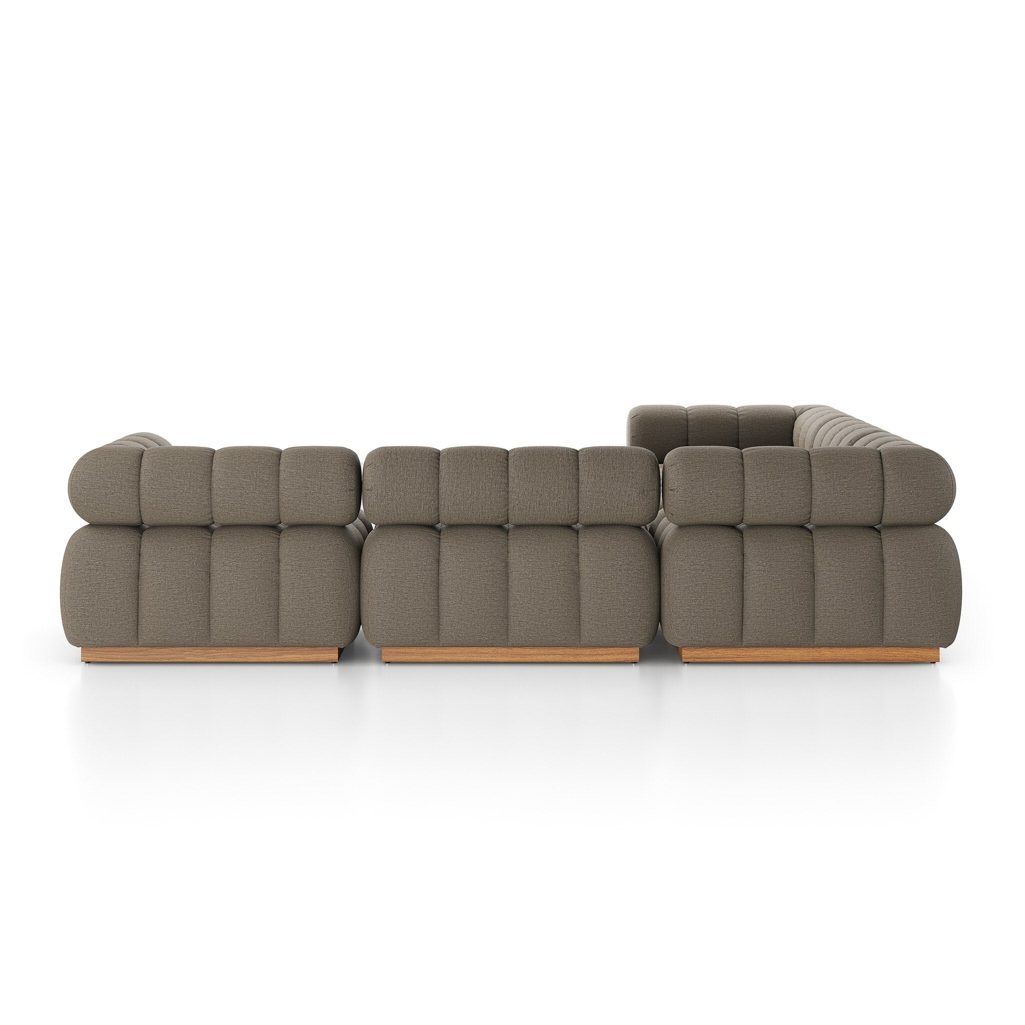 A modern take on mid-century Italian design, soft volume and exaggerated proportions fuse for a sculpted look and playful feel. Atop a plinth-style teak base, outdoor-friendly five-piece sectional features dramatic tufting for a padded sit, indoors and out. Amethyst Home provides interior design, new construction, custom furniture, and area rugs in the Miami metro area