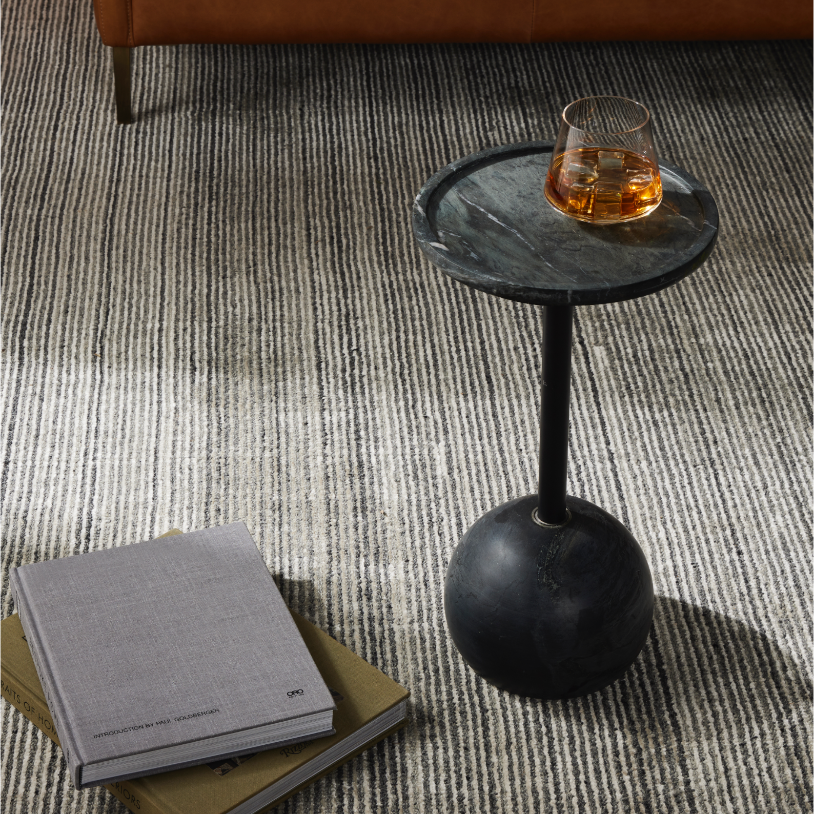 We love the abstract design of this Viola Black Marble Accent Table. Made from solid marble, the table brings an elegant feel to any space. Amethyst Home provides interior design, new home construction design consulting, vintage area rugs, and lighting in the Park City metro area.