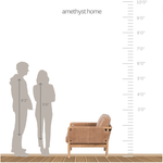 Safari inspiration meets zen aspirations. A cylindrical frame is crafted, smoothed and rounded from solid ash wood. Includes two loose feather-blend cushions covered in subtly distressed thick cut leather in a neutral taupe hue for a monochromatic look.Overall Dimensions: 27.75"w x 34.00"d x 30.50"h Amethyst Home provides interior design, new home construction design consulting, vintage area rugs, and lighting in the Park City metro area.