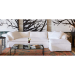 Wind down from a long day in this comfortable, easy-care slipcovered Donato White Slipcovered Linen Sectional with Chaise. This casual, chic sectional will bring the whole family together for years to come. Amethyst Home provides interior design, new home construction design consulting, vintage area rugs, and lighting in the Calabasas metro area.
