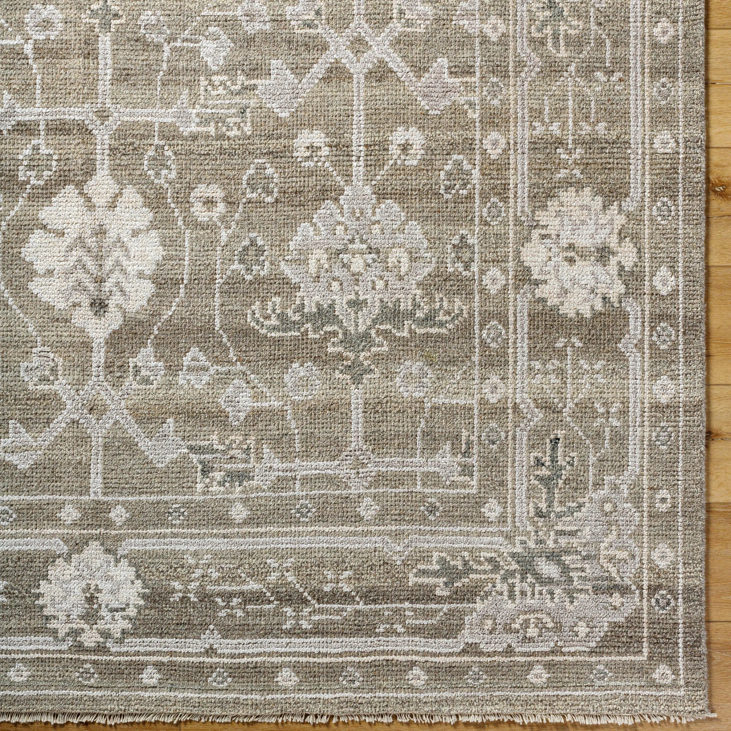 Featuring Almeria Hand-Knotted Rug by Surya at Amethyst Home. This luxurious Almeria hand-made rug is the perfect statement piece to add a touch of updated traditional style to your home. Its blend of wool and viscose gives it a soft feel and low pile, making it ideal for high traffic areas in your home. With its intricate hand-knotted construction and fringe . Amethyst Home provides interior design, new home construction design consulting, vintage area rugs, and lighting in the Austin metro area.