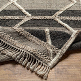 Bring a touch of global-inspired sophistication to your living space with the Cadiz Handmade Rug. This hand knotted wool rug has a plush pile, offering an inviting feel underfoot. The fringe detail adds texture and visual interest, while its Moroccan-style pattern gives this piece a timeless yet modern look. Amethyst Home provides interior design, new home construction design consulting, vintage area rugs, and lighting in the Winter Garden metro area.