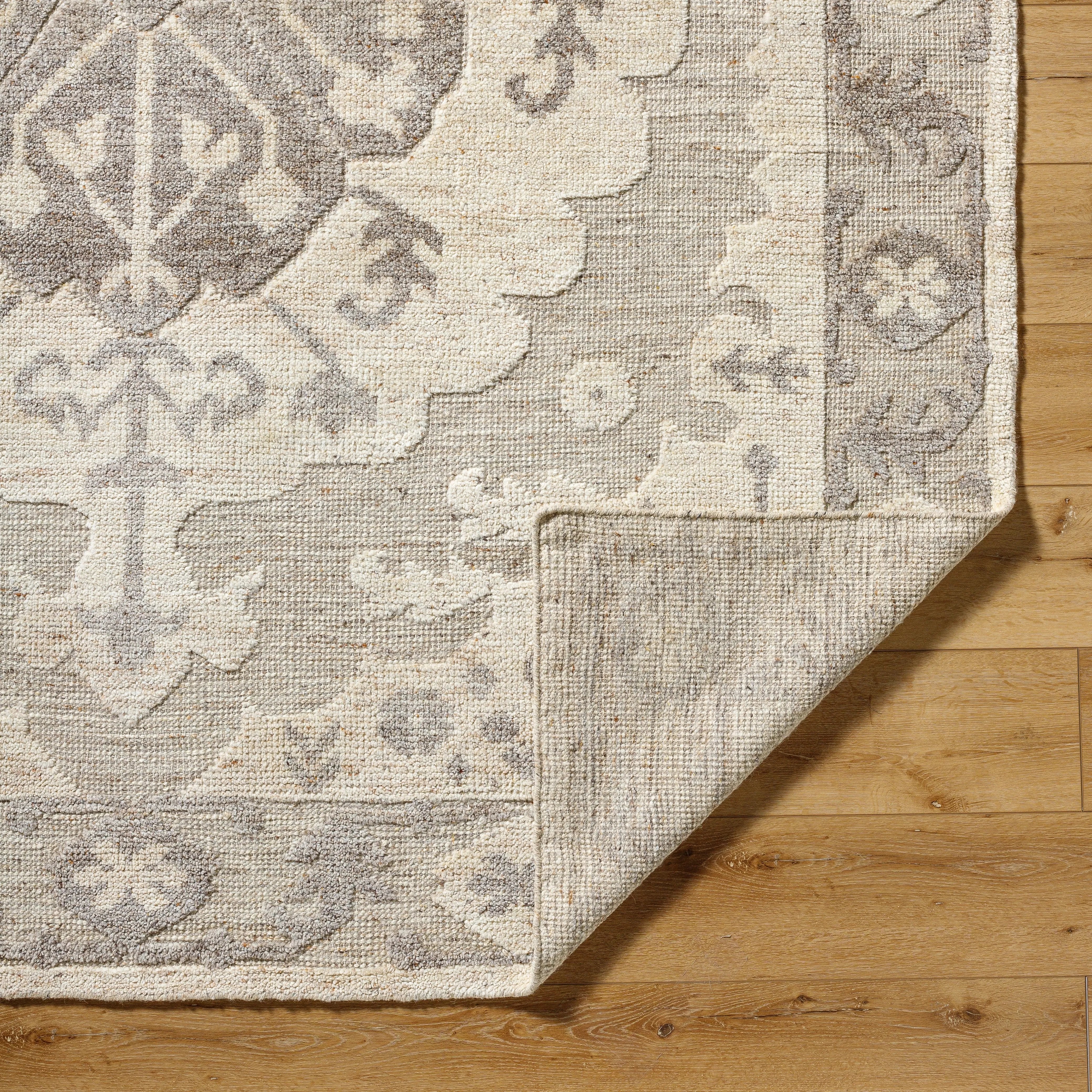 Featuring Hadiya Hand-Knotted Rug by Surya at Amethyst Home. Hand-knotted with precision and care, the Hadiya Rug is the perfect addition to any room. Crafted from high-quality materials, this rug boasts durability and timeless beauty. Add warmth and style to your home with this luxurious rug.
100% WoolHand KnottedLow PileThickness: 0.4"Max Width: 15'Max Length. Amethyst Home provides interior design, new home construction design consulting, vintage area rugs, and lighting in the Miami metro area.