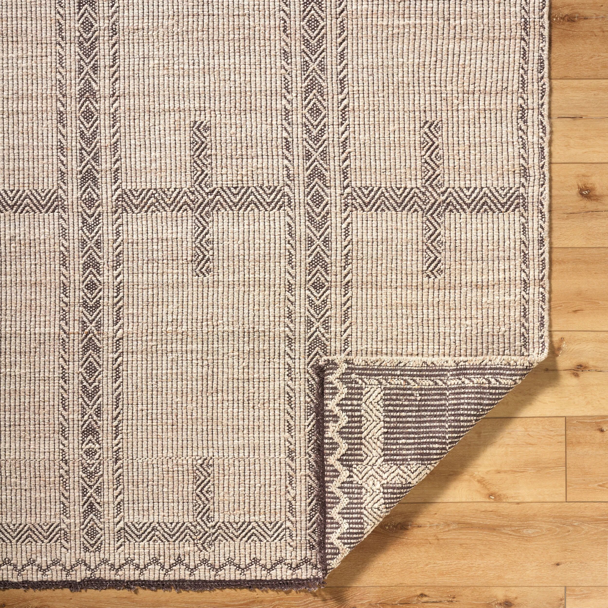 Step into a world of comfort and Bohemian charm with the Irfan handmade rug. Constructed in India, this handwoven rug is an exquisite blend of cotton and wool, offering exceptional durability along with a delightful underfoot feel. Its distinctive global style makes it a perfect centerpiece for any space that needs a dash of artistic flair. Amethyst Home provides interior design, new home construction design consulting, vintage area rugs, and lighting in the Kansas City metro area.